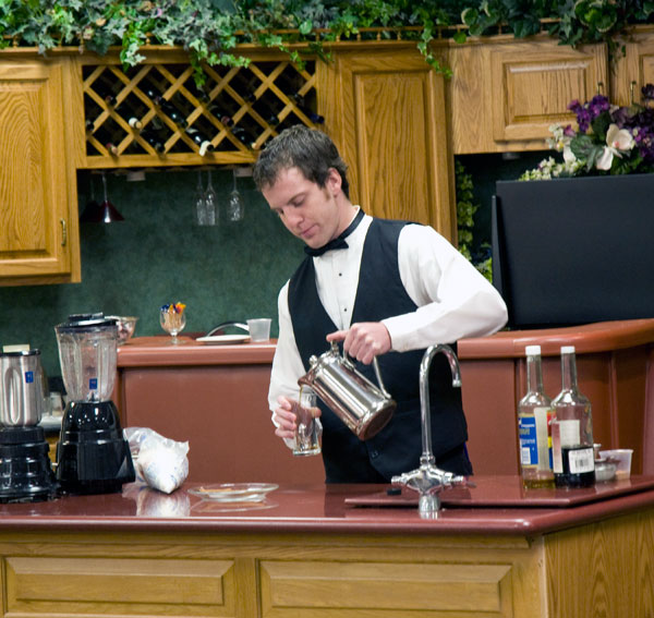 Hospitality student Aaron D. Hileman whips up a nonalcoholic beverage during a mixology workshop.