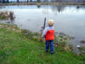 A youngster explores the Earth Science Center's pond - a home for geese, ducks and fish