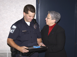 Officer William T. Chubb receives his awards from Penn College President Dr. Davie Jane Gilmour.
