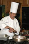Chef Michael J. Ditchfield, instructor of hospitality management/culinary arts, demonstrates how to braise short ribs.