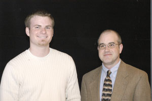 Justin D. Wilcott, left, with Bruce E. Huffman, instructor of media arts and video production