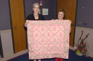 'Relay for Life' quilt is displayed by Davie Jane Gilmour, left, and Ann R. Durinzi.