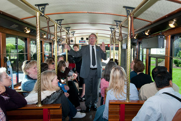 William J. Martin, Penn College's senior vice president, doubles as a guide on a trolley trip across campus.