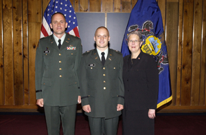 Lt. Col. Nathan D. Smyth (left) and Penn College President Dr. Davie Jane Gilmour flank 2nd Lt. Stephen P. Legarski