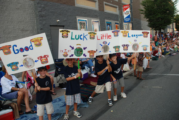 A group from West Hanover shows off its innovative candy-catcher signs. 