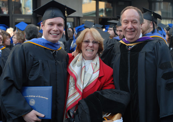 Ryan P. Shannon, presented with the Board of Directors Award, celebrates with Gerri F. Luke, associate professor of business administration/management and marketing, and Steven J. Moff, professor of business administration/management and marketing.