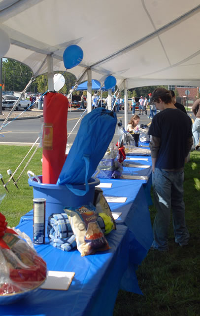 Ben Mix, an electronics and computer engineering technology student from South Williamsport, checks out the items available at the "silent auction."