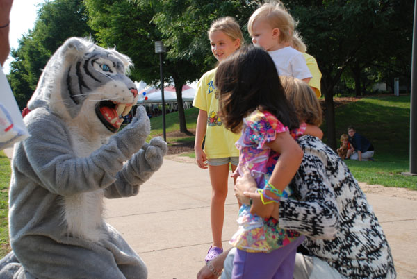 The Wildcat checks out a silly band from the daughter of Tarah S. Mileto, grants and contracts specialist.