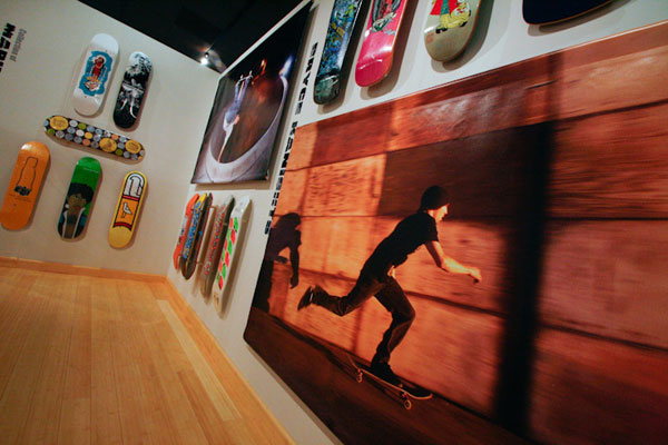 Vibrant photographs add multimedia touch to exhibit.