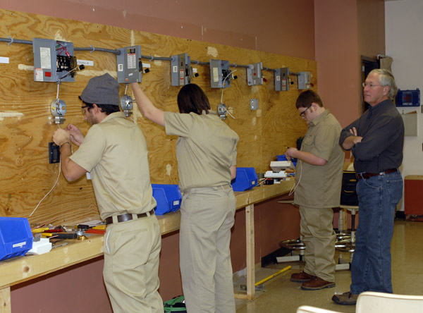 An electrical lab is the venue for students in residential wiring, judged by Jim E. Temple, who recently retired as assistant professor/department head of electrical technology/occupations.