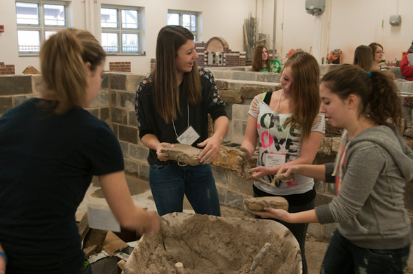 SMART Girls get a kick out of working with stone and mortar in the Construction Masonry Building.