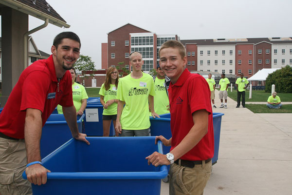 Resident Assistants Corvin K. Oberholtzer, left, and Dustin C. Bailey stand ready with blue bins.