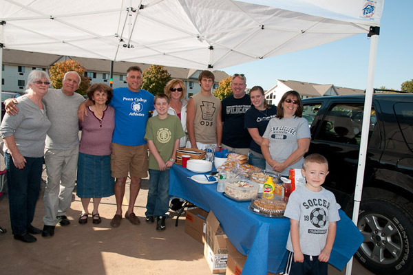 The families of the two seniors on the men's soccer team   William "Billy" DeAngelo, of Dallas, and Patrick Kehoe, of Oley   get together for a tailgate.