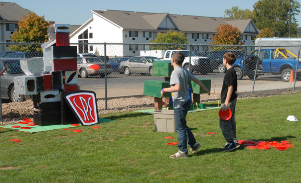 The Society of Plastics Engineers' interactive challenge  complete with discs manufactured by the club  won first place in the "Stand-Still Float" competition.