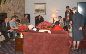 Dr. Davie Jane Gilmour, Penn College president, chats with the victorious men's soccer team during a championship reception in the Professional Development Center.