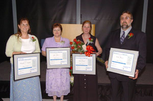 From left, Kindell N. Snyder, Part-Time Teaching Excellence Award winner%3B Jeri L. Moser, Distinguished Staff Award winner for Classified employees%3B Susan B. Deuel,  Distinguished Staff Award winner for APT employees%3B and Dale E. Henne, Distinguished Staff Award winner for Service employees. 
