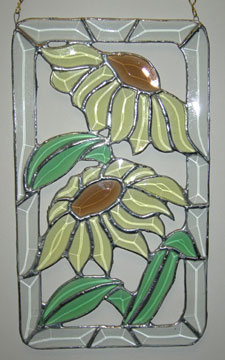 Stained-glass black-eyed susans, created by faculty member Keith Whitesel and won by Irv Siegel, among Annual Fund Employee Campaign prizes.
