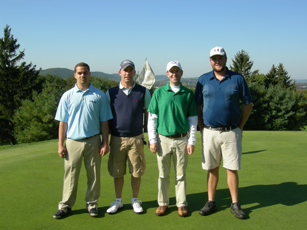 With an astounding 14-under-par finish, a team led by Wildcat golf coach Matt Haile took top honors in Saturday's alumni tournament at Three Ponds Golf Course in Elysburg. Joining Haile ('06, information technology, second from right), are Eric Schall ('11, plastics and polymer technology), Jeffrey Kerr II ('08, civil engineering) and Tony Stopper.