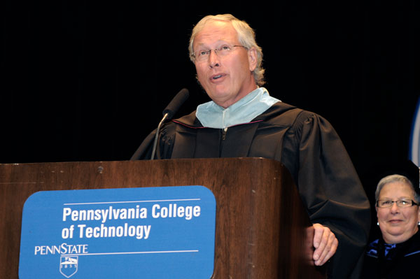 Jim E. Temple, College Service Award recipient, thanks the graduates for sharing their day  and wishes them each a career to rival his in satisfaction.