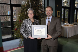 Dan Vilello, this year's Distinguished Citizenship%2FHumanitarian Award winner, with college President Davie Jane Gilmour.