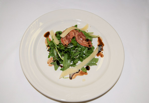 The salad course: arugula, pancetta chips, shaved Asiago and a balsamic reduction