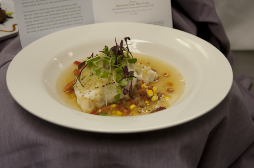 The entrée: Potato-crusted sea bass served with butter-bean succotash and saffron broth