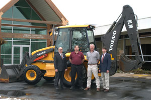 From left, Wayne R. Longbrake, dean of natural resources management%3B Skip Briar, district manager, Volvo Construction Equipment North America Inc.%3B Henry Sorgen, regional manager, Highway Equipment %26amp%3B Supply Co.%3B and Joseph C. Straw, instructor, diesel equipment technology.