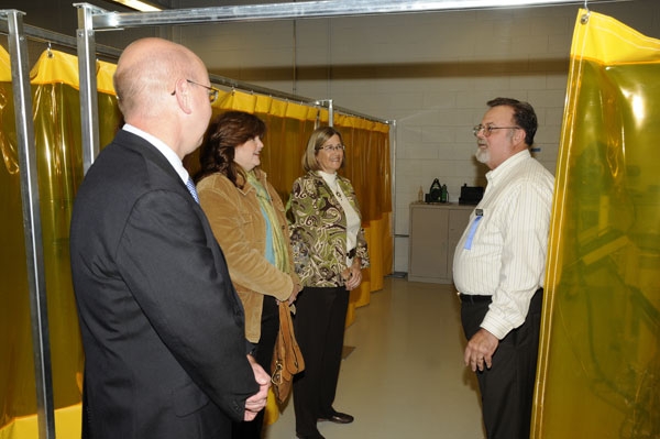 Robert M. Vaughn, right, a member of the welding faculty and 1983 graduate in technology studies, talks with fellow alumni, from left, David L. and Kathleen A. Maciejewski (a part-time welding instructor) and Mary Ann Johnson, wife of college board member Steven P. Johnson and a 1999 graduate in legal assistant/paralegal studies. The Maciejewskis are members of the college's Pillar Society of planned givers: David is a 1982 graduate in computer information systems, Kathleen holds degrees in welding technology (1994) and general studies (2007).