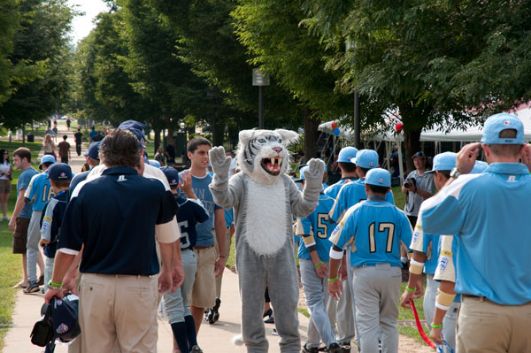 The Penn College mascot offers a double "high five" to series teams upon their arrival on campus.
