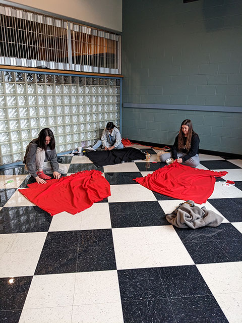 Campus community prepares dozens of blankets for foster children