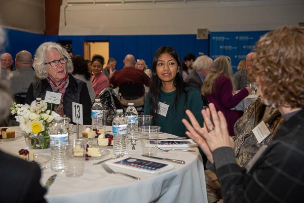Angelica J. Parrocho (center), recipient of the Dr. Kenneth E. and Mrs. Marion C. Carl Scholarship, listens to Kimberly R. Cassel (right) talk, as Susan Best looks on. Best is one of the donors to the scholarship in honor of her parents; her father was a former president of the institution. Parrocho, of Jersey Shore, is enrolled in electronics & computer engineering technology.