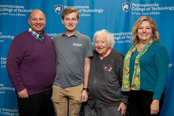 Brett B. Seelig II enjoys the day with his parents and grandmother. A network administration & engineering technology student from Haverford, Seelig was awarded the Admissions Scholarship.