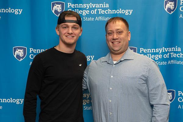 Recipient of the Penn College General Services Scholarship, Logan Z. Almeida (left), connects with Timothy O. Rissel, executive director of general services. Almeida, electrical technology, hails from Montgomery. 