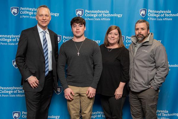 The college president joins Penn College Presidential Scholarship recipient Jake G. Skarbek and his parents. Skarbek, of Punxsutawney, is in heating, ventilation & air conditioning technology.