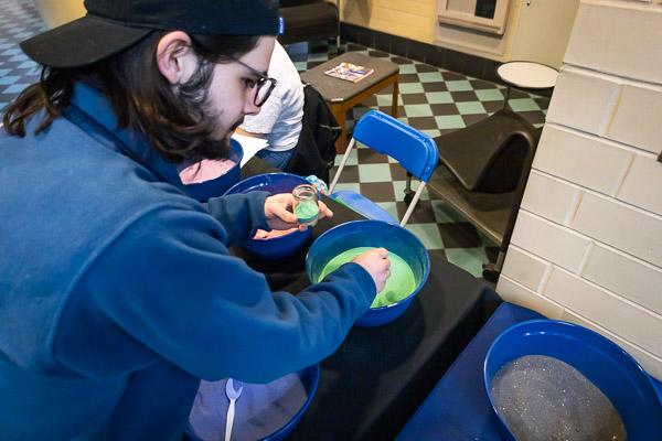 Justin R. Guthrie, a graphic design student from Mifflinburg, prepares a jar to take home ...