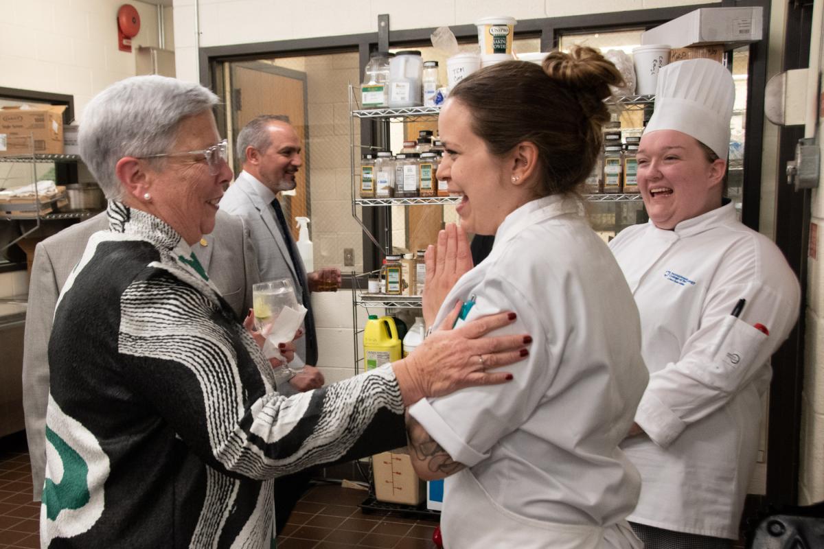 Recently retired Penn College President Davie Jane Gilmour reunites with Wisneski, along with current student M.J. Harbron, a baking & pastry arts student from Pottstown.