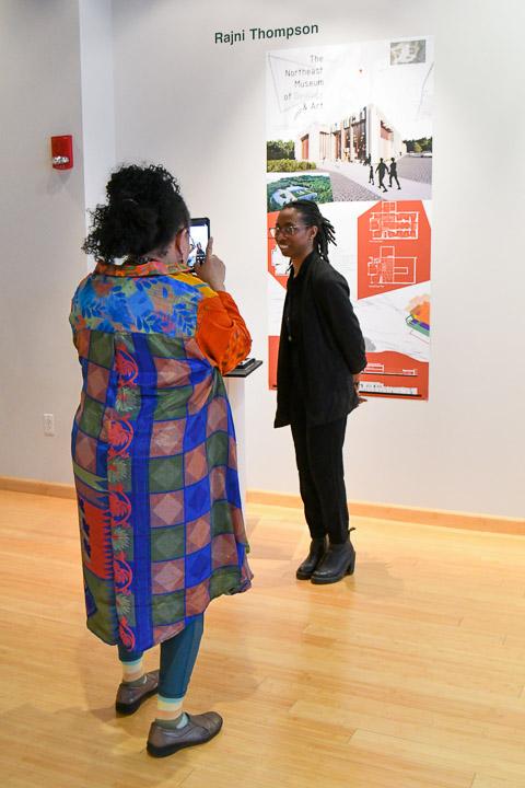 Rajni Thompson, who recently earned a perfect 200 score on the LEED Green Associate Exam, poses for a photo in the gallery.