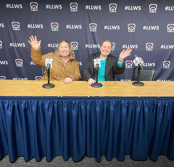 Leonard (left) and Stephanie McGuinness savor their postgame "press conference."