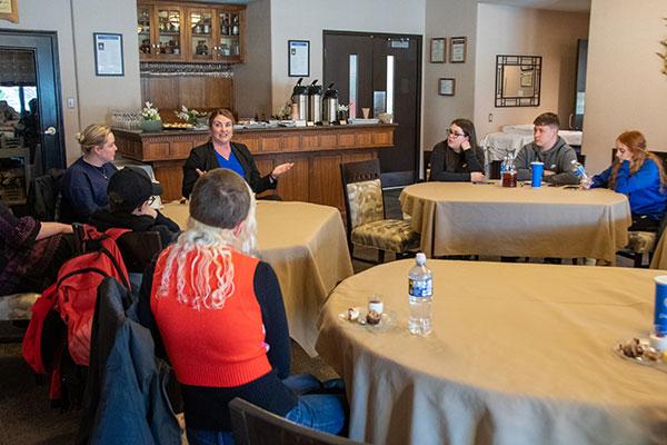 During “Coffee with Carla” in Le Jeune Chef Restaurant, North West Regional College’s contingent meets with Carla McCabe (in blue top with black blazer), president and CEO of WVIA Public Media, the PBS and NPR affiliate for Northeastern and Central Pennsylvania.