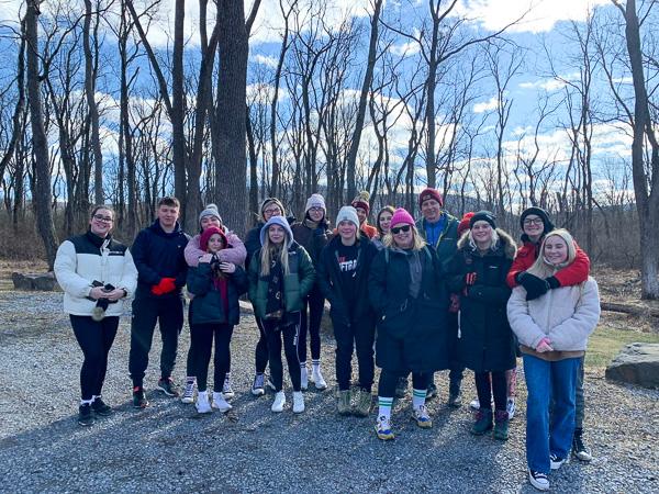 Bundled against an in-like-a-lion March chill, visitors join President Reed for a hike on the Williamsport Municipal Water Authority trails ...