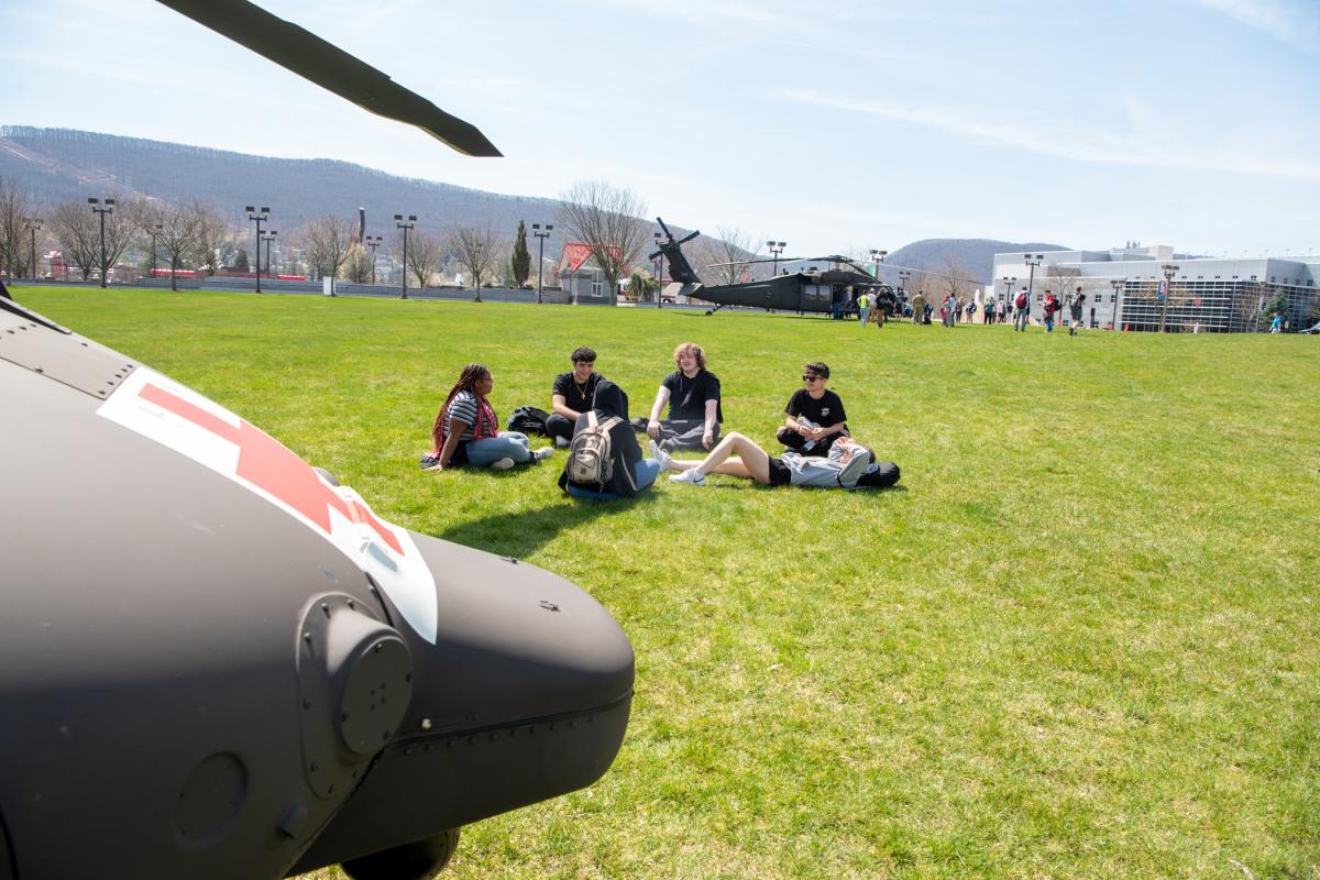 Chester County high school students enjoy the grandeur of the day – complete with Black Hawk helicopters.