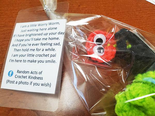 Piggybacking on the week's life-saving theme, Dining Services worker Danielle L. Parker crocheted a dozen delightful "Worry Worms" and placed them around Capitol Eatery for students to find and adopt. (Photo by Dining Services manager Danna M. Brooks)