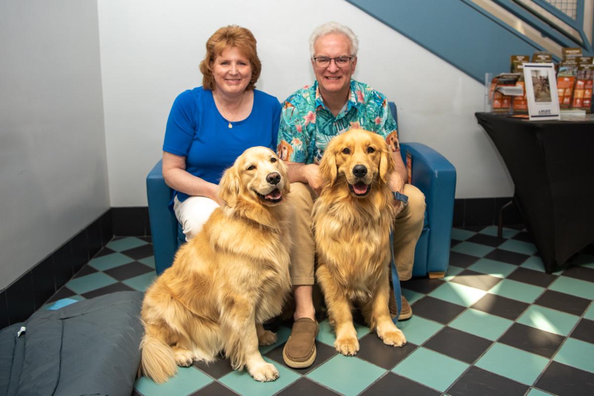 Family photo! Winnie (left) and Indy pose with their people: Tanya and Drew Potts. Drew is an assistant professor of civil engineering technology.  