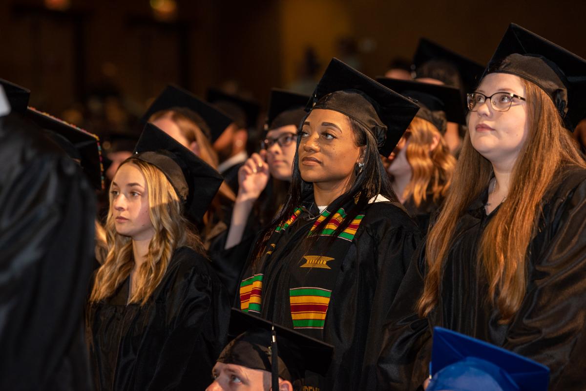 Wearing the stole of the Black Student Union, an organization she most recently served as president, Ashlee E. Massey joins classmates in a portrait of poise and focus. Massey earned a bachelor's degree in human services & restorative justice.