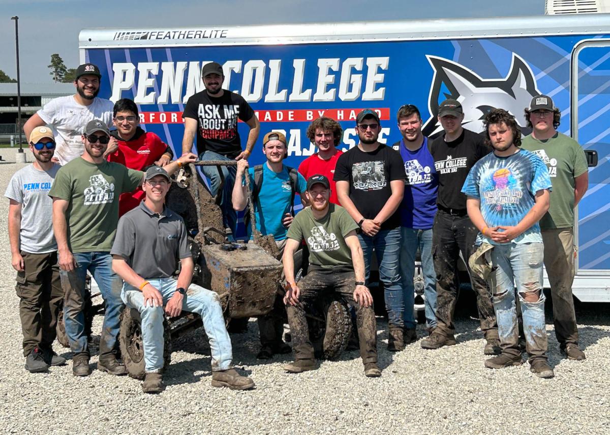 Team members include (from left): Casey B. Campbell, Alexander E. Flores, Alec D. Rees, Chethan C. Meda, Zach A. Tallman, Isaac H. Thollot, Daniel W. Bujcs, Marshall W. Fowler (sitting), Zander P. Beaver, Brian P. Rogers, Jacob P. Anderson, Jack J. Stump, Mitchell M. Wight and Trevor J. Lindsay. (Photo by John G. Upcraft)