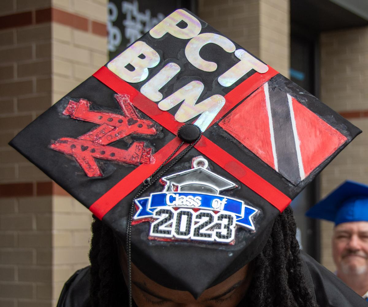 Steele's cap carries symbolism of his major, his alma mater, Black Lives Matter, Trinidad and Tobago, and his class year – plus the names of loved ones.