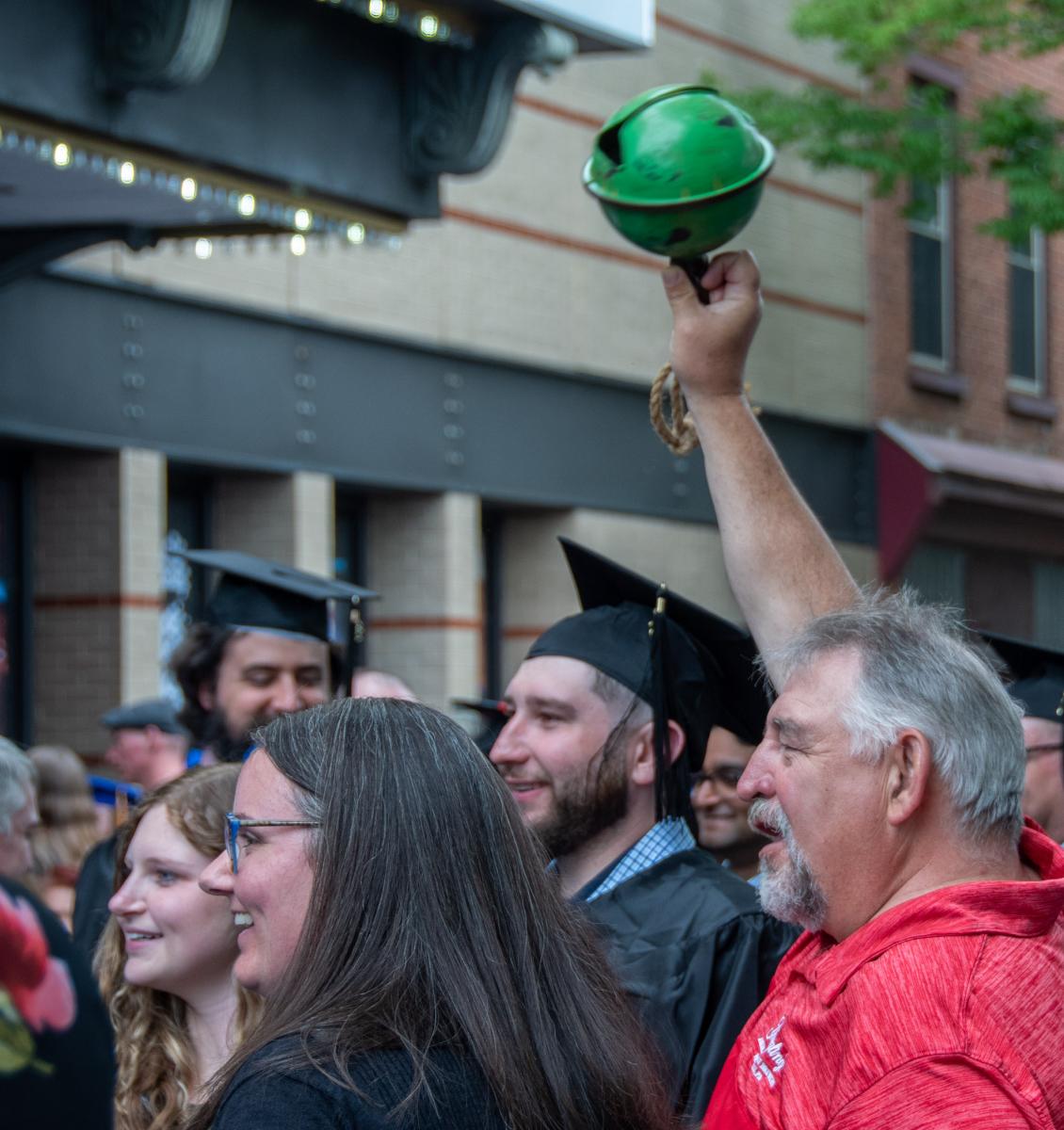 Inside, this hefty bell helped cheer on this family’s favorite grad. Outdoors, it was used to help that new alum find them in the post-commencement crowd.