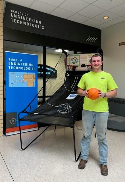 Avery W. Book, of Elizabethtown, was the winner of a basketball shootout game. He's a first-year student in heating, ventilation & air conditioning technology. (Photo by Dining Services' Noelle B. Bloom, assistant director)