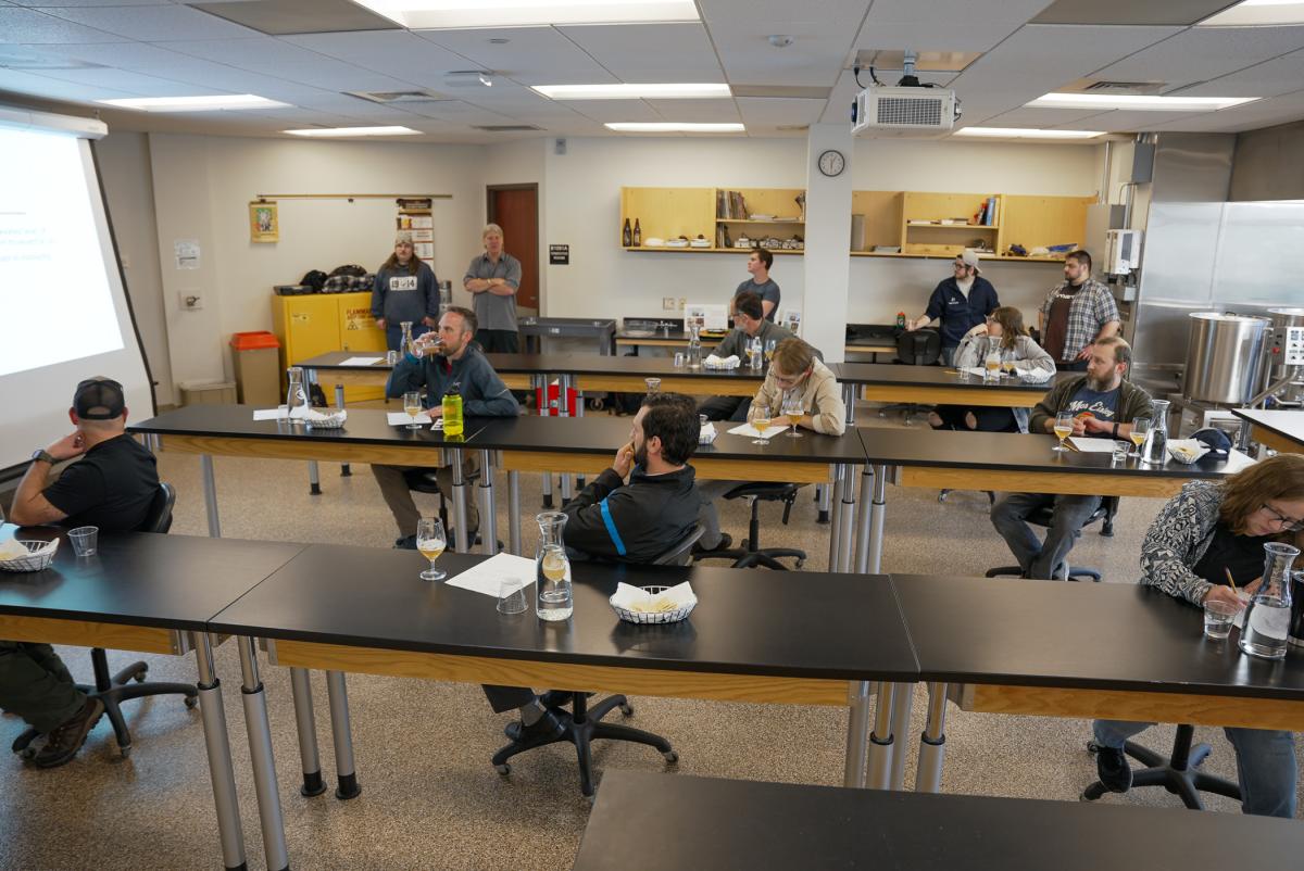 The first of two technical capstone presentations gets underway in the brewing lab.