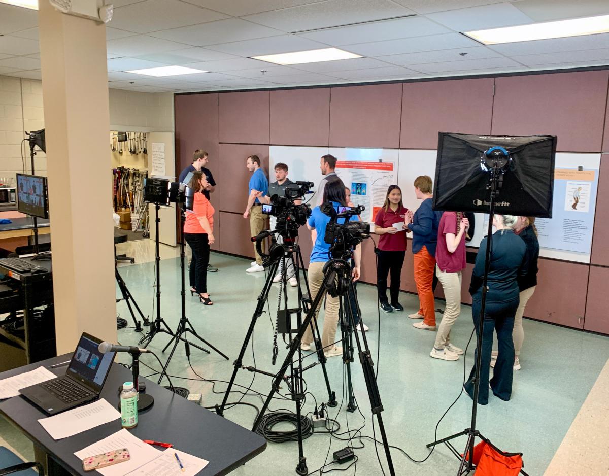 The physical therapist assistant Class of ’23 gathers to prepare for the big night.